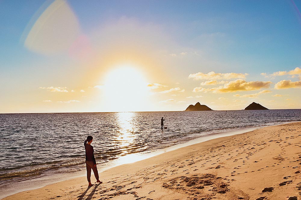 Young Boy Wearing Hawaiian Garland Walking Along Beach Makaha Oahu